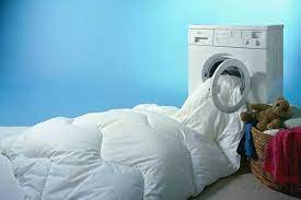 Как постирать тяжелое одеяло в стиральной машине: главные правила